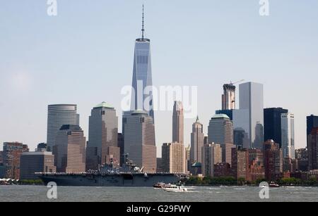 The amphibious assault ship USS Bataan transits up the Hudson River during the Parade of Ships to kick off Fleet Week May 25, 2016 in New York City, NY. Stock Photo