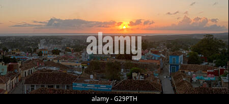 A 3 picture stitch panoramic view over Trinidad at sunset evening taken from the Convent de San Francisco de Asís bell tower. Stock Photo