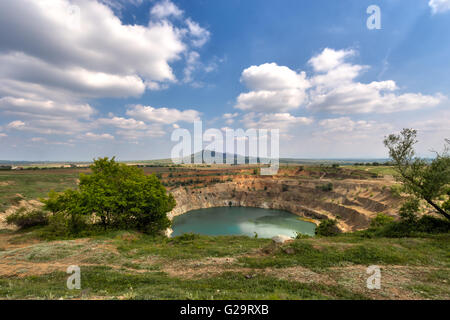 Abandoned open mine pit near Tsar Asen village in Bulgaria Stock Photo