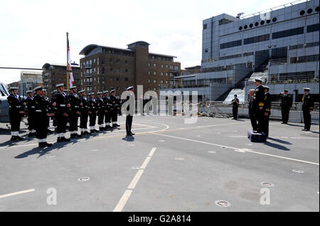 The Duke of York (right) inspects the Guard of Honour during a visit to HMS Duncan to mark the start of the Battle of Jutland centenary commemorations at Thames Quay in West India Dock, London. Stock Photo