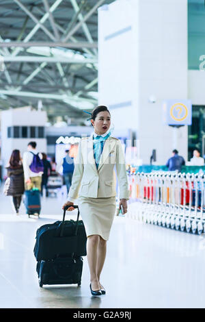 Incheon, South Korea - February 15, 2016: Asian Korean female flight attendant at Incheon International airport. Stock Photo