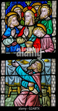 LIER, BELGIUM - MAY 16, 2015: Stained Glass window in St Gummarus Church in Lier, Belgium, depicting Jesus and the Apostles at t Stock Photo