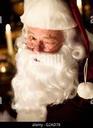 Portrait of Santa Claus winking Stock Photo - Alamy