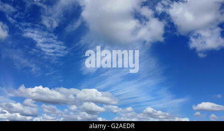 blue sky with lots of white clouds Stock Photo