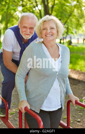 Two active senior people on a keep fit trail in summer Stock Photo