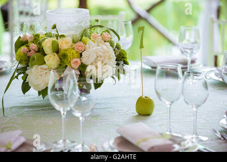 Summer table setting in green Stock Photo