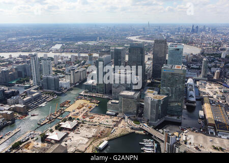 An aerial view of Canary Wharf with the City of London visible behind