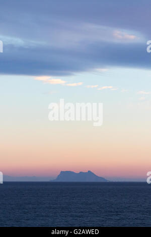 The Rock of Gibraltar seen at sunset from Spain, Europe Stock Photo