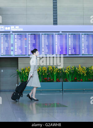 Incheon, South Korea - February 15, 2016: Asian Korean female flight attendant at the International airport of Incheon. Stock Photo