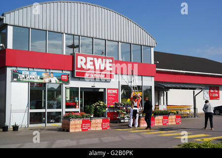 Entrance of a REWE supermarket, part of the REWE Group Stock Photo