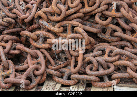 Industry - Pile of rusty old chains Stock Photo