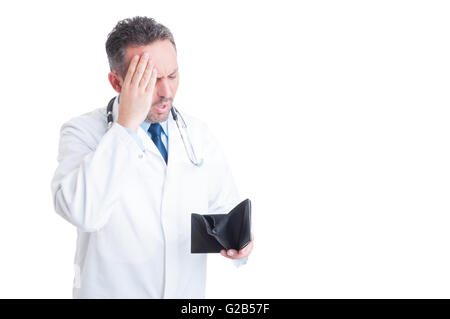 Upset medic or doctor checking empty wallet isolated on white background Stock Photo