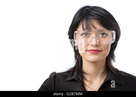 young attractive female wears protective glasses, studio shot isolated on white background Stock Photo