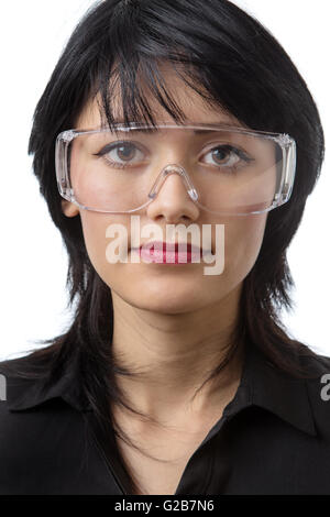 young attractive female wears protective goggles, studio shot isolated on white background Stock Photo