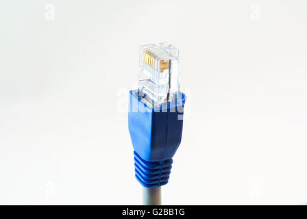 Network Cable RJ45 Head on white background . Stock Photo