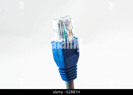 Network Cable RJ45 Head on white background . Stock Photo