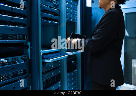 People fix server network in data room . Stock Photo