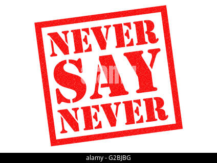 NEVER SAY NEVER red Rubber Stamp over a white background. Stock Photo