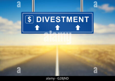 divestment words on blue road sign with blurred background Stock Photo