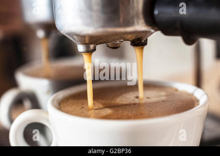 Machine making delicious Coffee in this morning Stock Photo