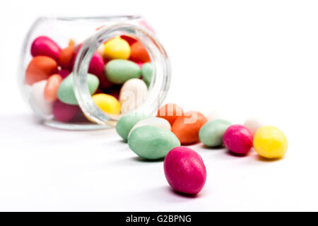 Spilled From Jar Color Candy Isolated On White Background Stock Photo