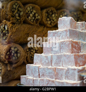 Pyramid of Turkish Delight and stack of pistachio pastries in a shop window in Sultanahmet, Istanbul, Turkey Stock Photo