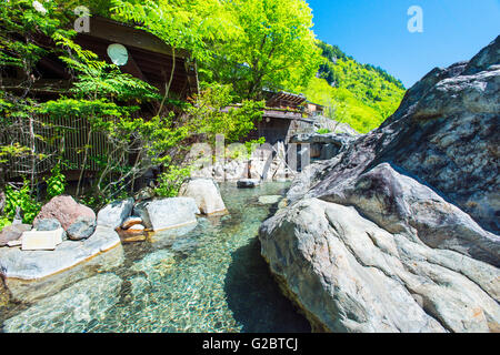 One the the rotenburo outdoor baths at Yarimikan ryokan in Gifu, Japan Stock Photo