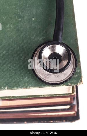 Old Books Black Stethoscope Isolated on White Background Stock Photo