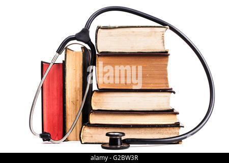 Old Books Black Stethoscope Isolated on White Background Stock Photo