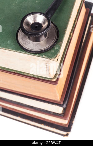 Old Books Black Stethoscope Isolated on White Background Stock Photo