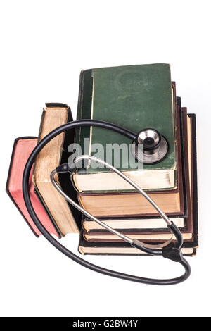 Old Books Black Stethoscope Isolated on White Background Stock Photo