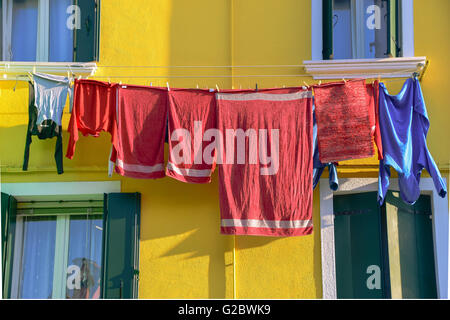 Drying laundry in the colourful Burano, Venice Stock Photo