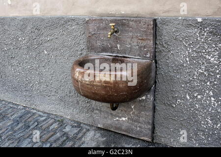 Washbasin -  gargoyle in old Prague Stock Photo