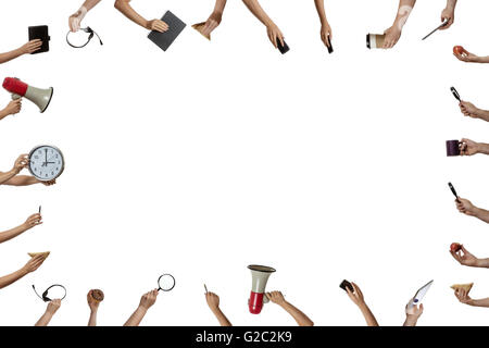 background of many hands holding objects Stock Photo