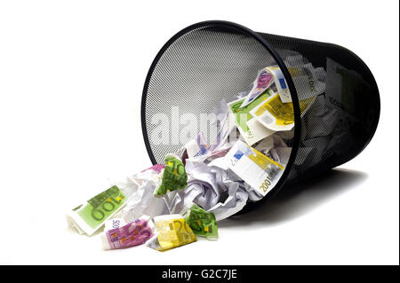 To throw its money with the dustbin by error or ignorance in the business Stock Photo