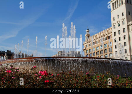 Fountain with water jets in Placa Catalunya, in the center of the city of Barcelona Stock Photo