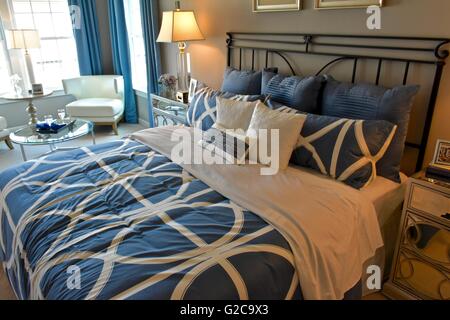 A model home master bed Stock Photo