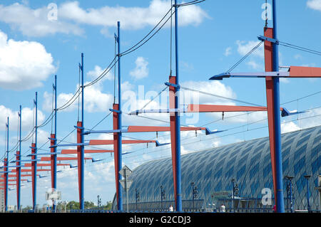 Poznan, Poland - July 13, 2014: Modern tram electric traction and unidentified people at main railway station in Poznan, Poland Stock Photo