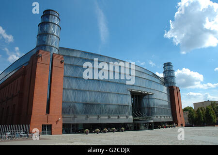 Poznan, Poland - July 13, 2014: Front of Stary Browar shopping centre modern building in Poznan, Poland. Unidentified people in Stock Photo