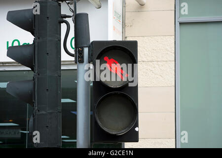 british pelican crossing with pictogram of red man at unusual angle, kingston upon thames, surrey, england Stock Photo