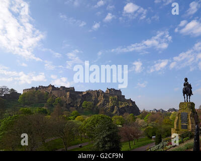 Edinburgh castle and the Royal Scots Greys Memorial in west Princes street gardens Scotland Stock Photo