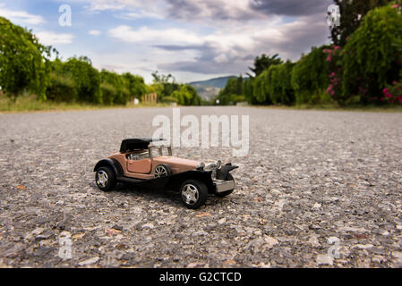 Early 1900s old toy car still life image. Stock Photo