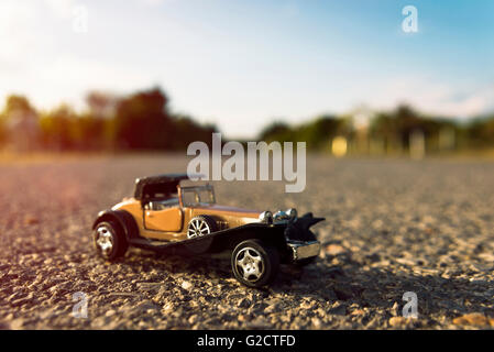 Early 1900s old toy car still life image. Stock Photo