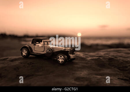 Early 1900s old toy car still life image. Stock Photo