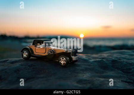 Early 1900s old toy car still life image. Stock Photo