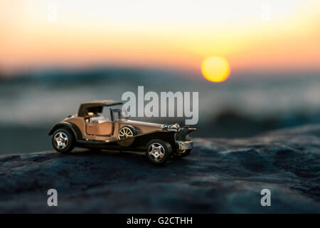 Early 1900s old toy car still life image. Stock Photo