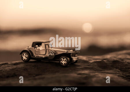 Early 1900s old toy car still life image. Stock Photo