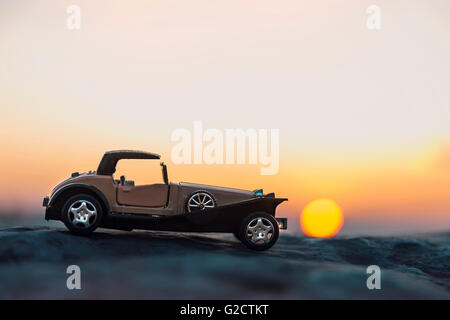 Early 1900s old toy car still life image. Stock Photo