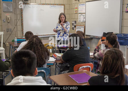 Teacher in the classroom with high school students Stock Photo