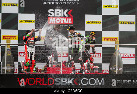 Donington Park,  UK. 28th May, 2016. Race 1 Podium featuring race winner Tom Sykes second place  Davide Giugliano and third place Jonathan Rea Credit:  steven roe/Alamy Live News Stock Photo